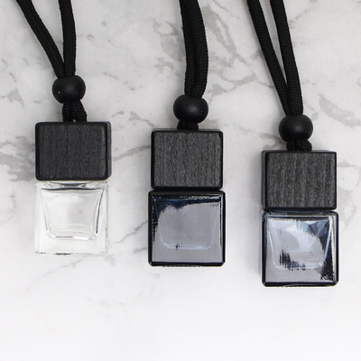Buy 8ml Black Aroma Diffuser Bottle Diffuser Glass Hanging Perfume Bottle With Black Wood Lids online manufacture